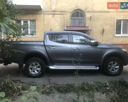 Серый Мицубиси Л 200, объемом двигателя 2.44 л и пробегом 149 тыс. км за 25000 $, фото 3 на Automoto.ua