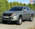 Серый Мицубиси Л 200, объемом двигателя 2.44 л и пробегом 160 тыс. км за 19999 $, фото 1 на Automoto.ua