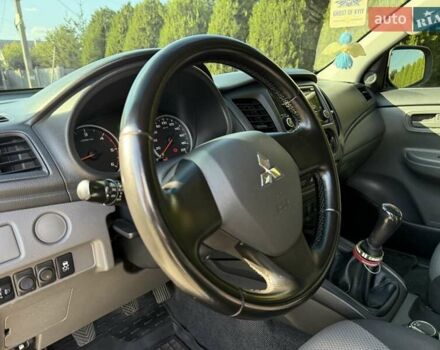 Серый Мицубиси Л 200, объемом двигателя 2.44 л и пробегом 160 тыс. км за 19999 $, фото 11 на Automoto.ua
