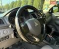 Серый Мицубиси Л 200, объемом двигателя 2.44 л и пробегом 160 тыс. км за 19999 $, фото 11 на Automoto.ua