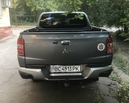 Серый Мицубиси Л 200, объемом двигателя 2.44 л и пробегом 149 тыс. км за 25000 $, фото 2 на Automoto.ua