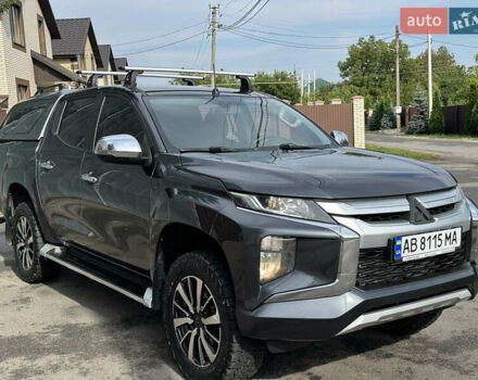 Серый Мицубиси Л 200, объемом двигателя 2.44 л и пробегом 139 тыс. км за 22999 $, фото 5 на Automoto.ua