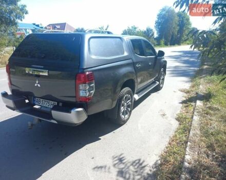 Серый Мицубиси Л 200, объемом двигателя 2.44 л и пробегом 57 тыс. км за 34500 $, фото 3 на Automoto.ua