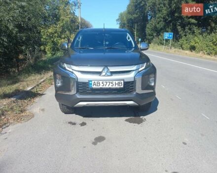 Серый Мицубиси Л 200, объемом двигателя 2.44 л и пробегом 57 тыс. км за 34500 $, фото 1 на Automoto.ua