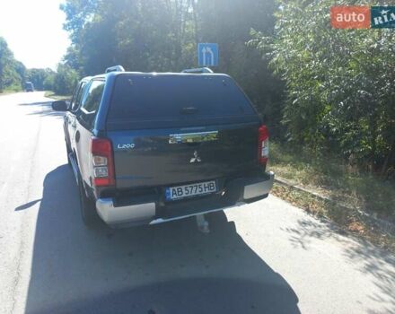 Серый Мицубиси Л 200, объемом двигателя 2.44 л и пробегом 57 тыс. км за 34500 $, фото 4 на Automoto.ua