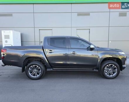 Серый Мицубиси Л 200, объемом двигателя 2.44 л и пробегом 4 тыс. км за 44400 $, фото 4 на Automoto.ua