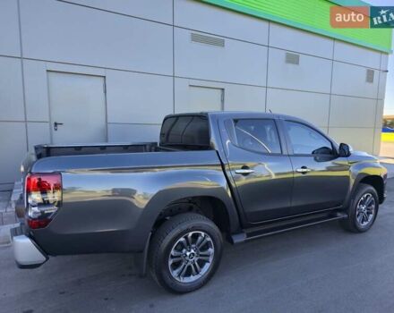 Серый Мицубиси Л 200, объемом двигателя 2.44 л и пробегом 4 тыс. км за 44400 $, фото 3 на Automoto.ua