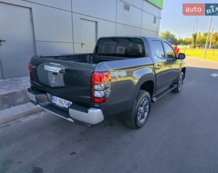 Серый Мицубиси Л 200, объемом двигателя 2.44 л и пробегом 4 тыс. км за 44400 $, фото 1 на Automoto.ua