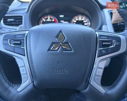 Серый Мицубиси Л 200, объемом двигателя 2.44 л и пробегом 4 тыс. км за 44400 $, фото 30 на Automoto.ua