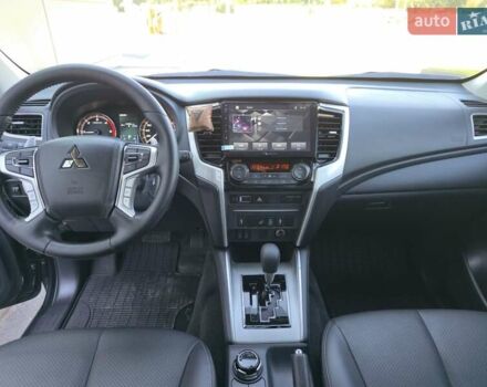 Серый Мицубиси Л 200, объемом двигателя 2.44 л и пробегом 4 тыс. км за 44400 $, фото 22 на Automoto.ua