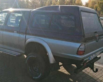 Серый Мицубиси Л 200, объемом двигателя 2.5 л и пробегом 183 тыс. км за 2500 $, фото 3 на Automoto.ua