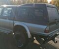 Серый Мицубиси Л 200, объемом двигателя 2.5 л и пробегом 183 тыс. км за 2500 $, фото 3 на Automoto.ua