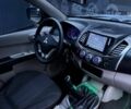 Серый Мицубиси Л 200, объемом двигателя 2.5 л и пробегом 260 тыс. км за 9900 $, фото 11 на Automoto.ua