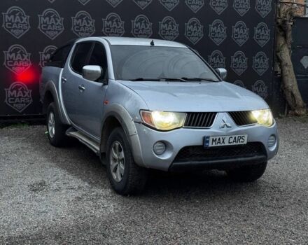 Серый Мицубиси Л 200, объемом двигателя 2.5 л и пробегом 260 тыс. км за 9900 $, фото 1 на Automoto.ua