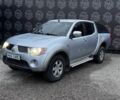 Серый Мицубиси Л 200, объемом двигателя 2.5 л и пробегом 260 тыс. км за 9900 $, фото 1 на Automoto.ua
