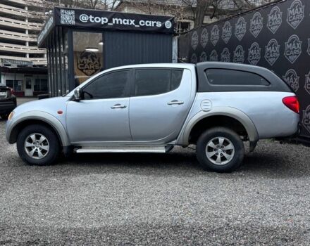 Серый Мицубиси Л 200, объемом двигателя 2.5 л и пробегом 260 тыс. км за 9900 $, фото 2 на Automoto.ua