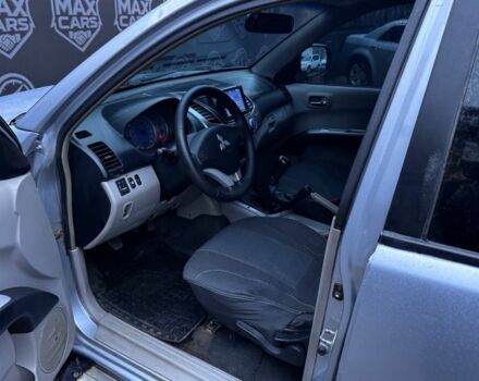 Серый Мицубиси Л 200, объемом двигателя 2.5 л и пробегом 260 тыс. км за 9900 $, фото 7 на Automoto.ua