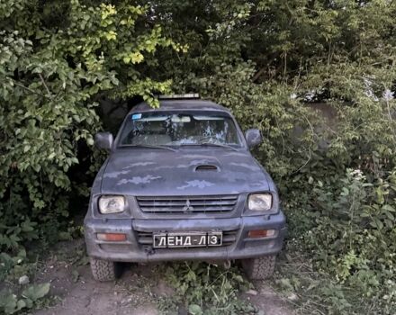 Сірий Міцубісі Л 200, об'ємом двигуна 2.5 л та пробігом 290 тис. км за 3100 $, фото 1 на Automoto.ua