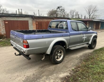 Серый Мицубиси Л 200, объемом двигателя 2.5 л и пробегом 199 тыс. км за 2500 $, фото 1 на Automoto.ua