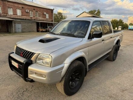 Мицубиси Л 200 2001 в Харькове на Automoto.ua Серый Мицубиси Л 200, объемом двигателя 2.5 л и пробегом 213 тыс. км за 4800 $, фото 1 на Automoto.ua