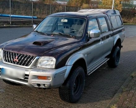 Серый Мицубиси Л 200, объемом двигателя 2.5 л и пробегом 183 тыс. км за 2500 $, фото 1 на Automoto.ua