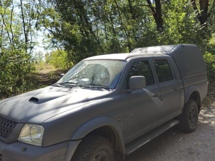 Серый Мицубиси Л 200, объемом двигателя 0 л и пробегом 277 тыс. км за 5339 $, фото 1 на Automoto.ua