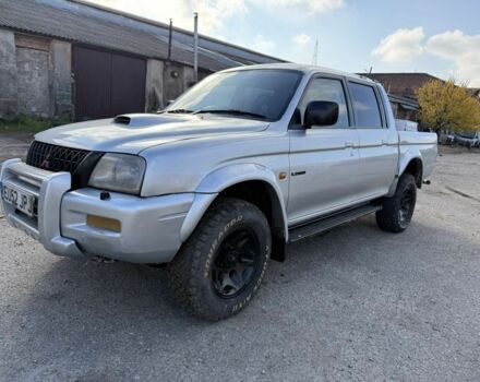 Серый Мицубиси Л 200, объемом двигателя 2.5 л и пробегом 220 тыс. км за 4300 $, фото 1 на Automoto.ua