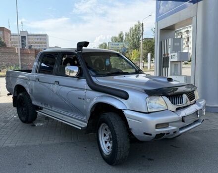 Серый Мицубиси Л 200, объемом двигателя 2.5 л и пробегом 285 тыс. км за 3400 $, фото 1 на Automoto.ua