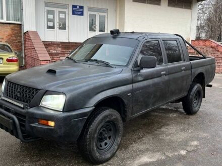Сірий Міцубісі Л 200, об'ємом двигуна 2.5 л та пробігом 100 тис. км за 4700 $, фото 1 на Automoto.ua