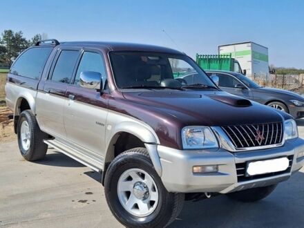Міцубісі Л 200 2004 у Києві на Automoto.ua Сірий Міцубісі Л 200, об'ємом двигуна 2.5 л та пробігом 120 тис. км за 2890 $, фото 1 на Automoto.ua