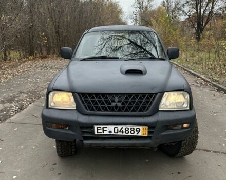 Сірий Міцубісі Л 200, об'ємом двигуна 2.5 л та пробігом 200 тис. км за 3650 $, фото 1 на Automoto.ua