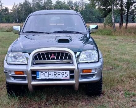 Сірий Міцубісі Л 200, об'ємом двигуна 2.5 л та пробігом 223 тис. км за 2600 $, фото 1 на Automoto.ua