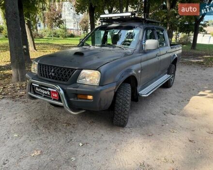 Серый Мицубиси Л 200, объемом двигателя 2.5 л и пробегом 621 тыс. км за 8790 $, фото 1 на Automoto.ua