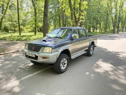 Міцубісі Л 200 2005 у Чернівцях на Automoto.ua Сірий Міцубісі Л 200, об'ємом двигуна 2.5 л та пробігом 155 тис. км за 6000 $, фото 1 на Automoto.ua