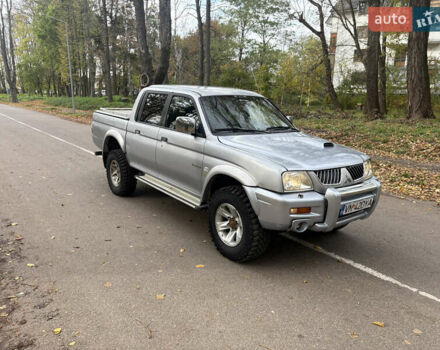 Серый Мицубиси Л 200, объемом двигателя 2.5 л и пробегом 260 тыс. км за 6669 $, фото 1 на Automoto.ua