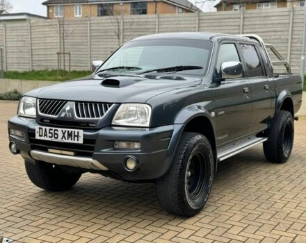 Серый Мицубиси Л 200, объемом двигателя 2 л и пробегом 212 тыс. км за 9941 $, фото 1 на Automoto.ua