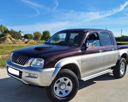 Серый Мицубиси Л 200, объемом двигателя 2.5 л и пробегом 244 тыс. км за 2650 $, фото 1 на Automoto.ua