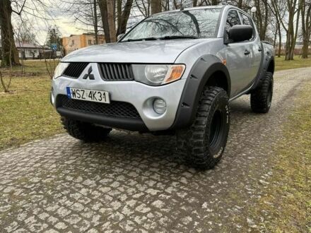 Серый Мицубиси Л 200, объемом двигателя 2.5 л и пробегом 215 тыс. км за 4200 $, фото 1 на Automoto.ua
