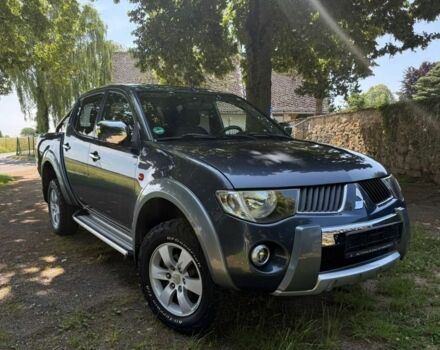 Серый Мицубиси Л 200, объемом двигателя 2.5 л и пробегом 210 тыс. км за 2950 $, фото 1 на Automoto.ua