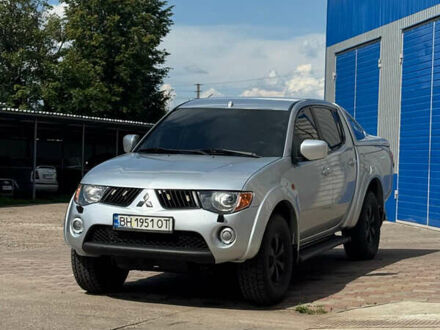 Сірий Міцубісі Л 200, об'ємом двигуна 2.4 л та пробігом 310 тис. км за 11900 $, фото 1 на Automoto.ua