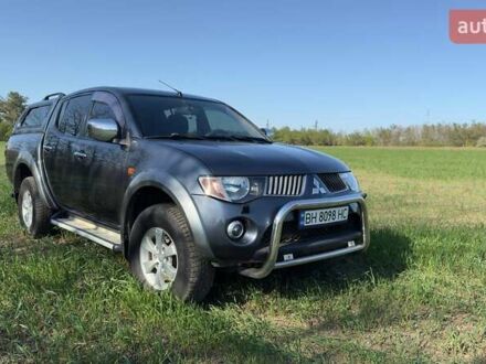 Серый Мицубиси Л 200, объемом двигателя 2.48 л и пробегом 234 тыс. км за 13000 $, фото 1 на Automoto.ua