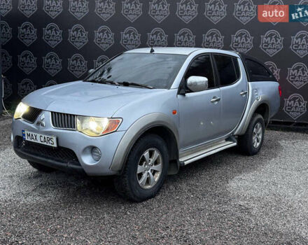 Серый Мицубиси Л 200, объемом двигателя 2.48 л и пробегом 260 тыс. км за 9900 $, фото 1 на Automoto.ua