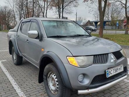 Серый Мицубиси Л 200, объемом двигателя 2.48 л и пробегом 397 тыс. км за 9000 $, фото 1 на Automoto.ua