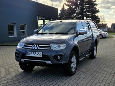 Серый Мицубиси Л 200, объемом двигателя 2.5 л и пробегом 130 тыс. км за 5222 $, фото 1 на Automoto.ua