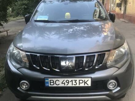 Серый Мицубиси Л 200, объемом двигателя 2.44 л и пробегом 149 тыс. км за 25000 $, фото 1 на Automoto.ua