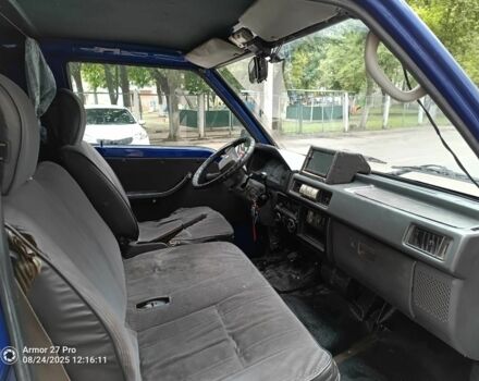 Синий Мицубиси Л 200, объемом двигателя 2 л и пробегом 400 тыс. км за 3100 $, фото 4 на Automoto.ua