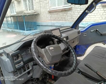 Синий Мицубиси Л 200, объемом двигателя 2 л и пробегом 400 тыс. км за 3100 $, фото 5 на Automoto.ua