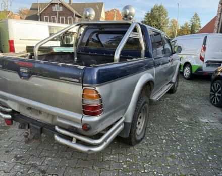 Синий Мицубиси Л 200, объемом двигателя 2.5 л и пробегом 270 тыс. км за 3583 $, фото 7 на Automoto.ua