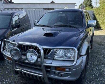 Синий Мицубиси Л 200, объемом двигателя 2.5 л и пробегом 270 тыс. км за 3583 $, фото 4 на Automoto.ua