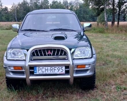 Синій Міцубісі Л 200, об'ємом двигуна 0 л та пробігом 240 тис. км за 2600 $, фото 2 на Automoto.ua